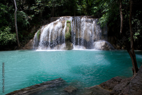 Erawan Waterfall in Kanchanaburi. Amazing turquoise water and wonderful jungle. Ideal place for a picnic and relaxation. One of the most famous tourist attractions in Kanchanaburi province  Thailand. 