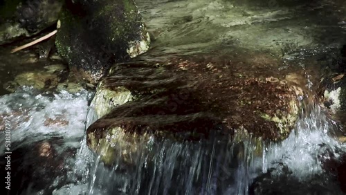 clear river water flowing over the rocks, close-up 4