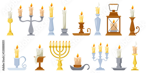 Retro ancient candlesticks, wax candle vintage holders. Medieval candelabra and candle stick set