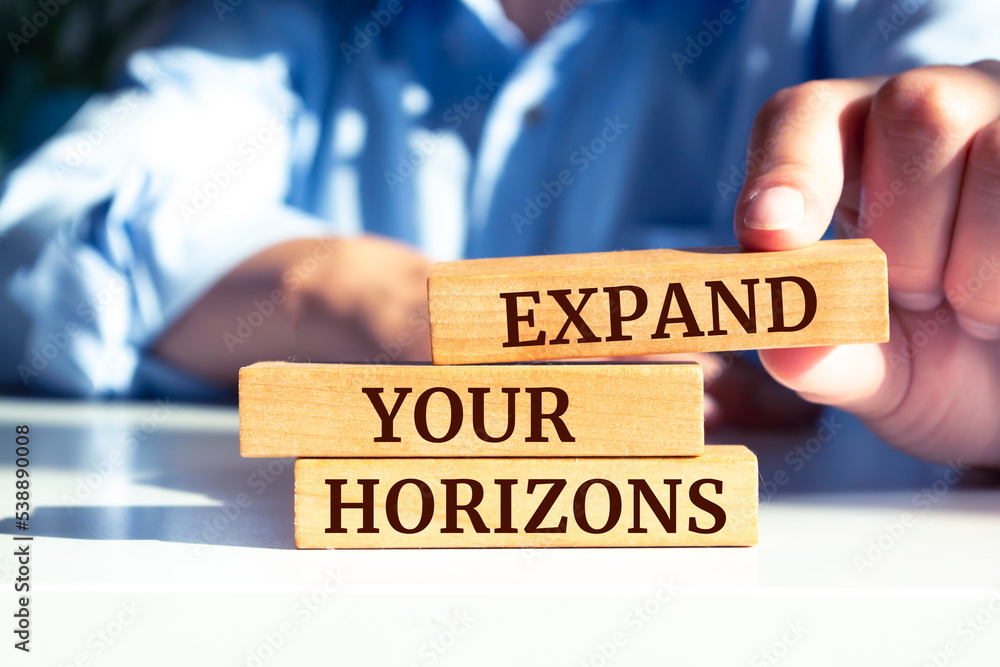 Wooden blocks with words 'Expand Your Horizons'. Wooden blocks with words 'Expand Your Horizons'.