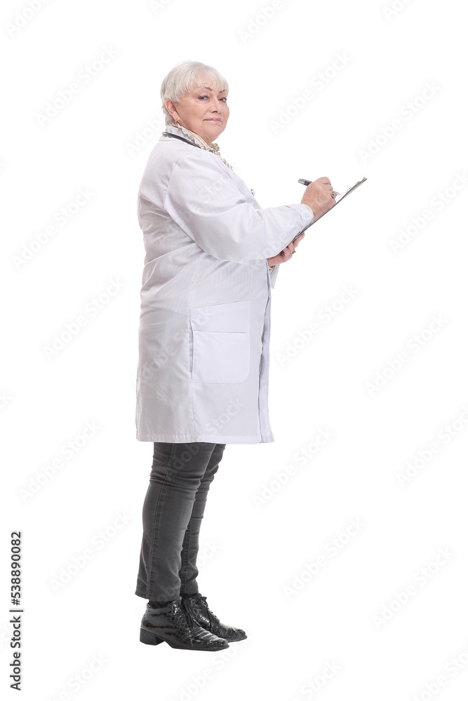 Profile side view portrait of mature doctor writing recommending filling medical form Profile side view portrait of mature doctor writing recommending filling medical form