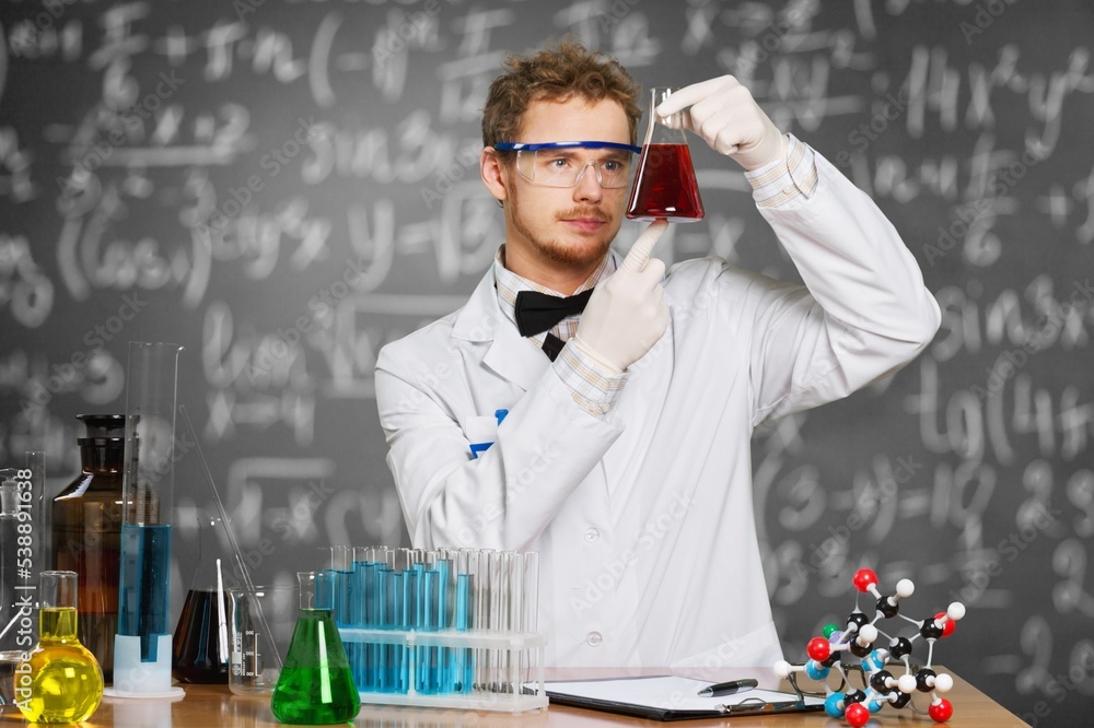 Young scientist hold flask for laboratory test Young scientist hold flask for laboratory test