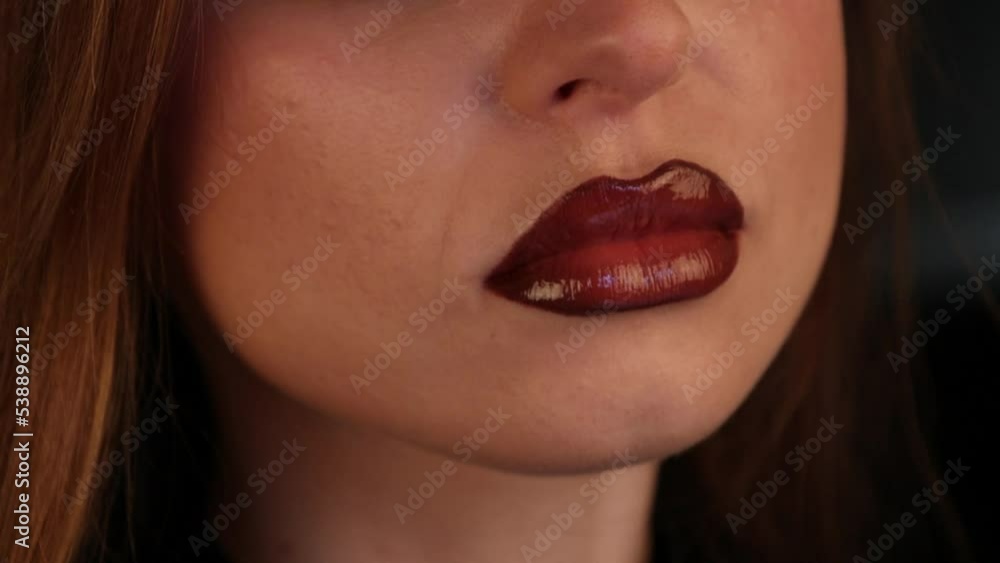 close up woman lips with red lipstick for halloween close up woman lips with red lipstick for halloween