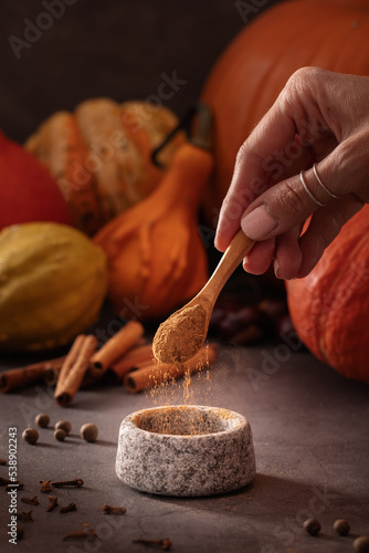 Preparing homemade pumpkin spice from scratch