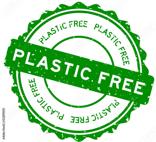 Grunge green plastic free word round rubber seal stamp on white background