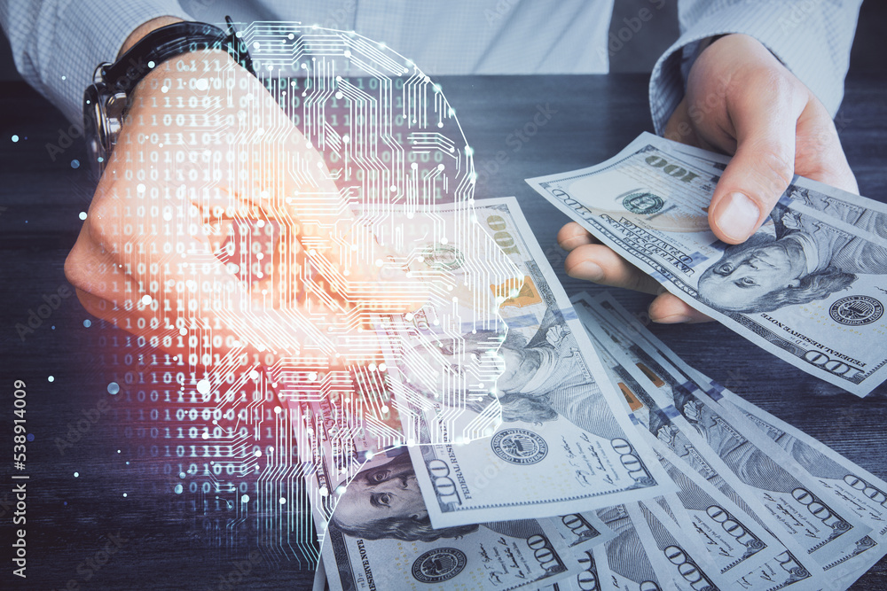 Multi exposure of brain drawing hologram and us dollars bills and man hands. Ai invest concept
