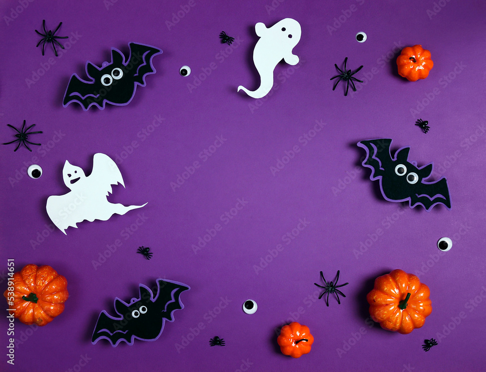 Halloween composition with ghosts, bats, spiders and pumpkins on purple background. Halloween composition with ghosts, bats, spiders and pumpkins on purple background.