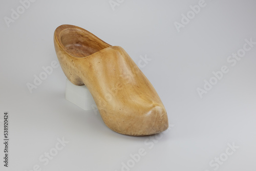 Wooden vintage clog isolated in studio