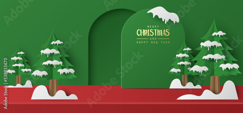 Paper cut of Merry Christmas banner studio table room product display with Christmas tree, copy space,  Merry Christmas and happy new year