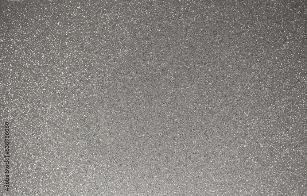Fototapeta premium Gray background of decorative plaster with abstract spots. Unusual silver wall texture with beautiful patterns, creative surface background. Dressing coating for building cladding.
