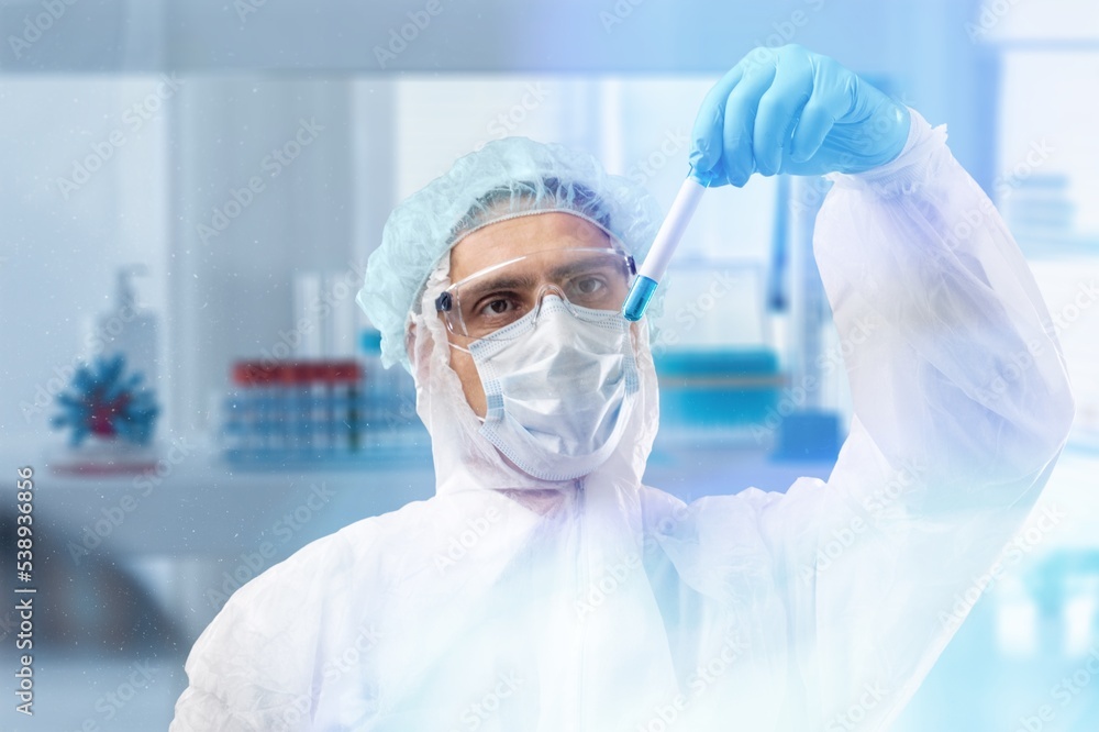 Laboratory worker with glass test tubes Laboratory worker with glass test tubes