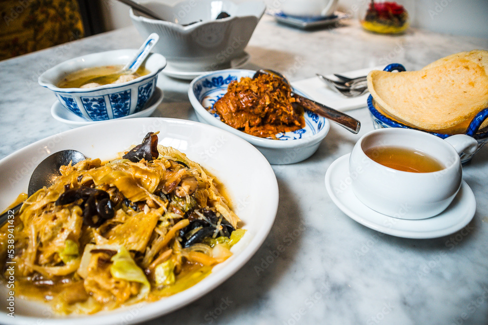 A Peranakan Chinese Malay mixed heritage cuisine meal of various dishes
