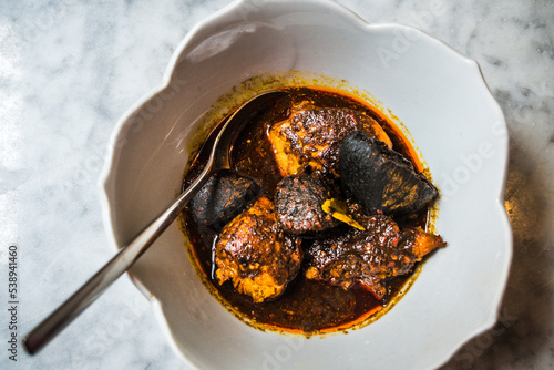 Main course of Peranakan dish Chicken Stewed with Black Nuts photo