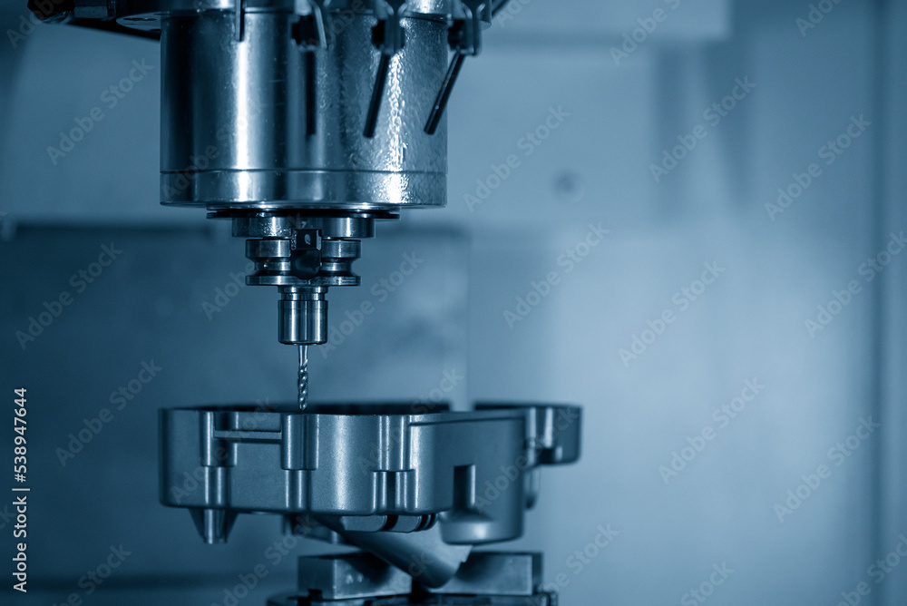 The 4-axis machining center tapping the aluminum gear housing parts. The 4-axis machining center tapping the aluminum gear housing parts.
