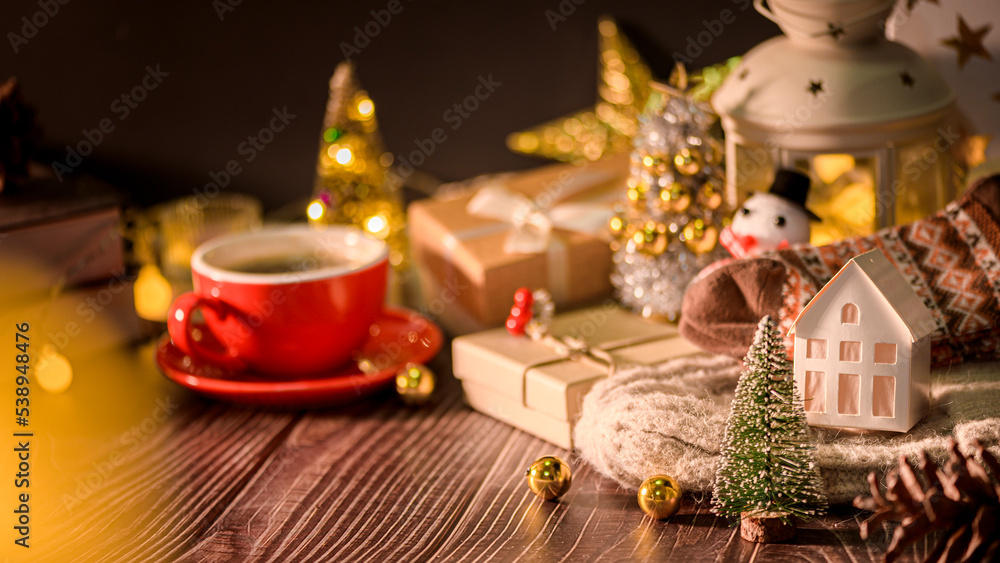 Christmas and Winter decorations on wooden table with decorative lights , Christmas background