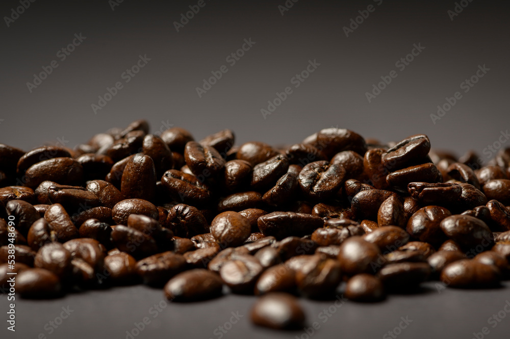 Fototapeta premium Coffee bean roasted on black background