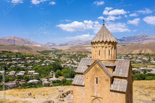 Aerial view of Surp Astvatzatzin (Holy Mother of God) Church and Areni village on sunny summer day. Vayots Dzor Province, Armenia.