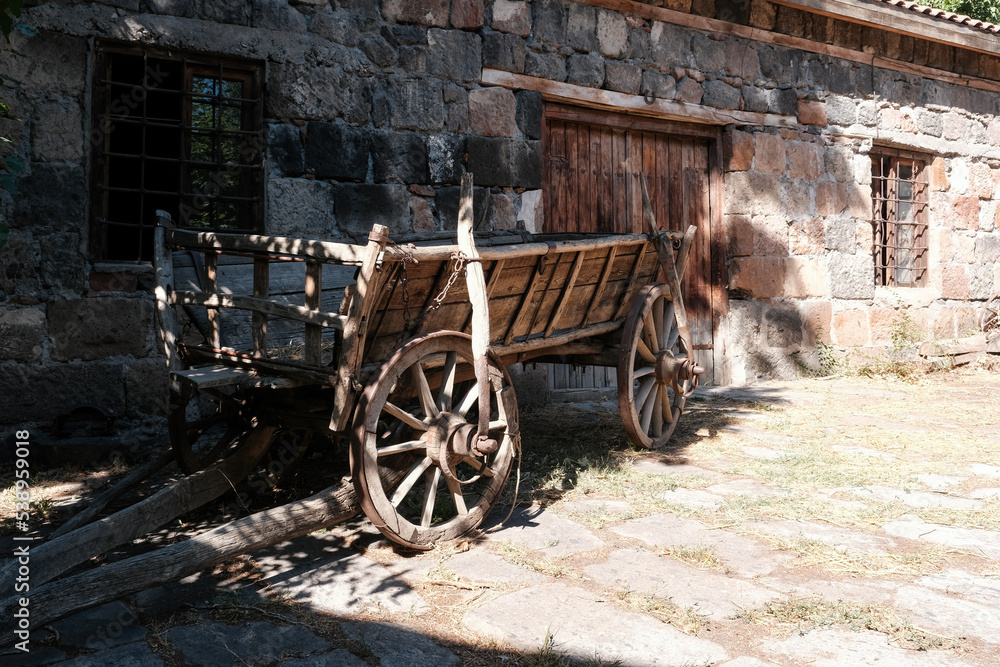 An old cart at a traditional barn. Ashtarak, Armenia.