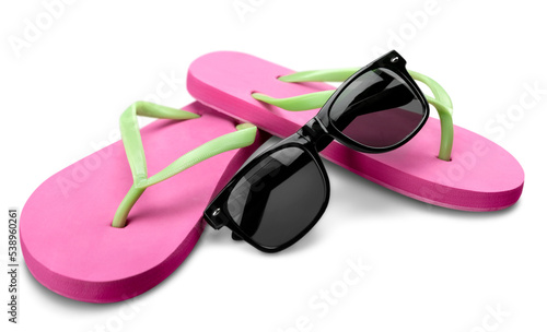 Billede på lærred Red flip flops and sunglasses on white