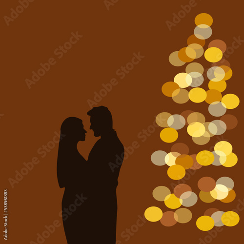 Silhouette of young people standing on the Christmas tree background