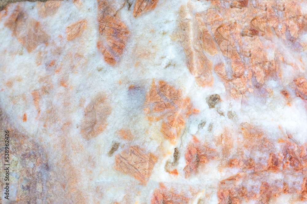 Stone texture background. On a white stone, veins and blotches of light ...