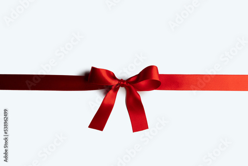 Red ribbon bow isolated on white