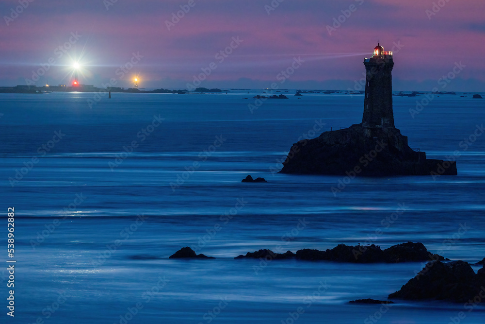 La Vieille lighthouse illuminated at night