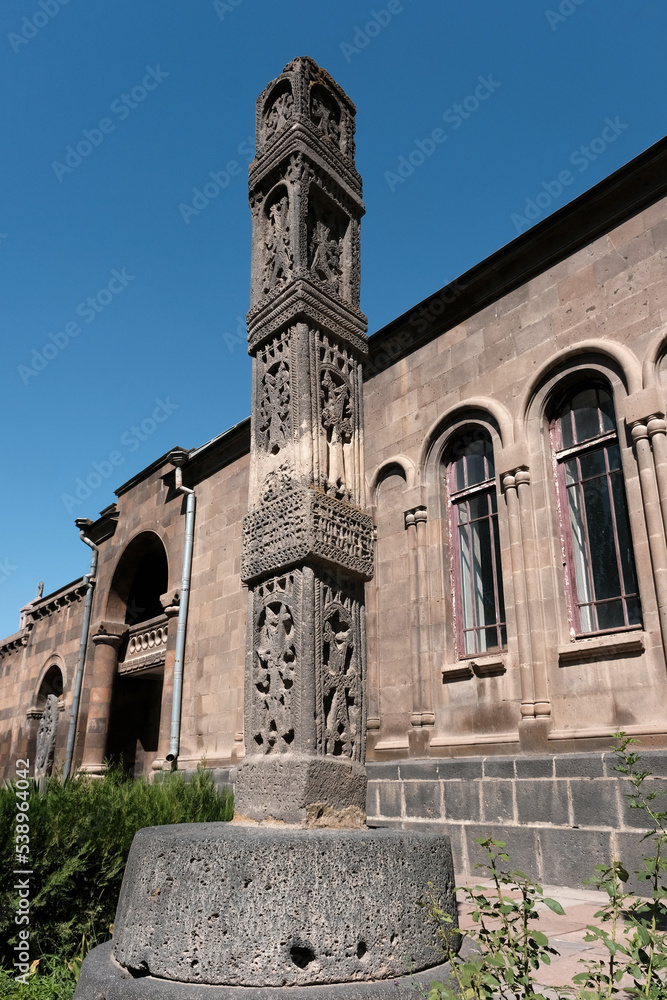 Medieval stone column in the yard of Etchmiadzin monastery. Vagharshapat, Armenia.