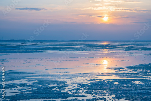 sunset over the frozen sea  Kalajoki  Finland