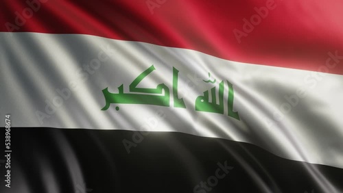 A waving flag of Iraq in the best quality with a fabric texture. Slow motion. 4K loop animation. photo