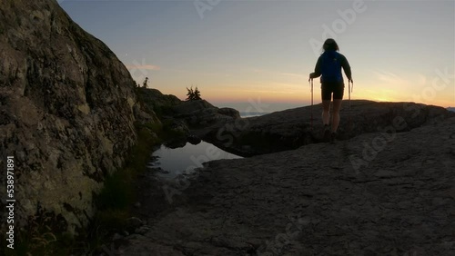 Wallpaper Mural Adventurous Woman Hiker on top of Canadian Mountain Landscape. Sunny Sunset Sky. Top of Mt Seymour near Vancouver, British Columbia, Canada. Adventure Travel Concept Torontodigital.ca