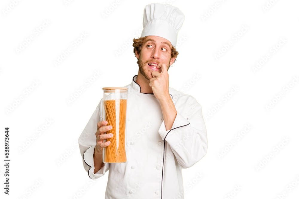 Young cook man isolated on white background relaxed thinking about something looking at a copy space. Young cook man isolated on white background relaxed thinking about something looking at a copy space.