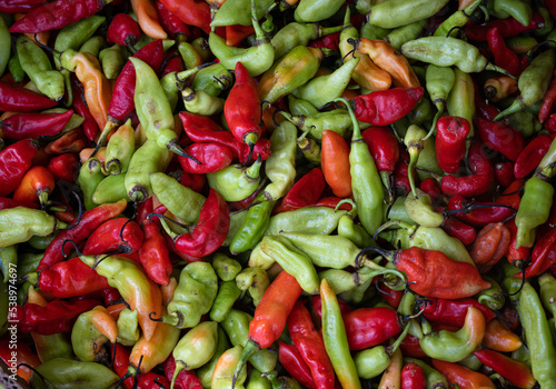 Peppers on sale on market stall in Pointe à Pitre, Guadeloupe, French West Indies © timsimages.uk