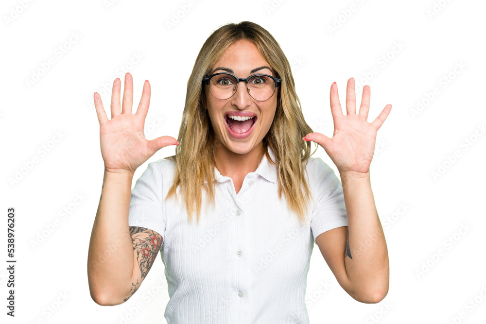 Young caucasian woman isolated on green chroma background receiving a pleasant surprise, excited and raising hands. Young caucasian woman isolated on green chroma background receiving a pleasant surprise, excited and raising hands.