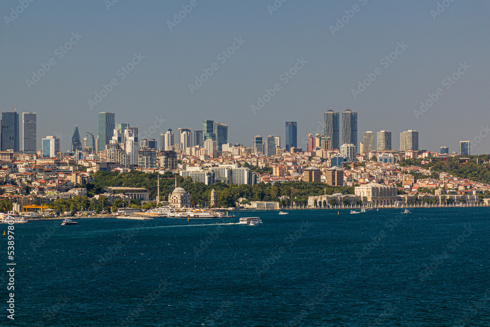 Dolmabahce Mosque and Palace by Bosporus strait in Istanbul, Turkey Dolmabahce Mosque and Palace by Bosporus strait in Istanbul, Turkey
