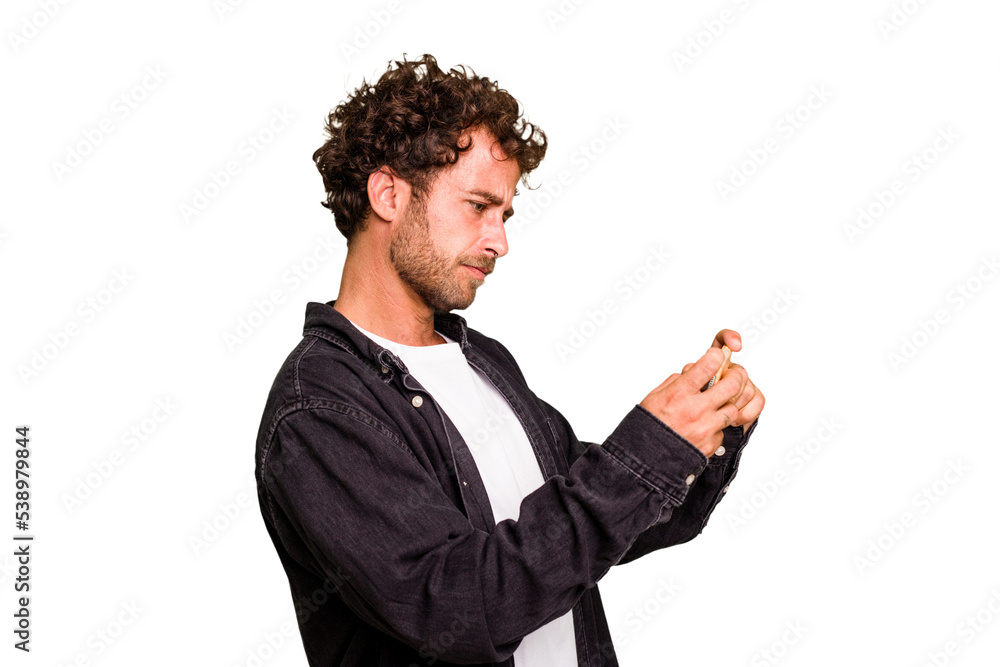 Young caucasian man using mobile phone isolated Young caucasian man using mobile phone isolated