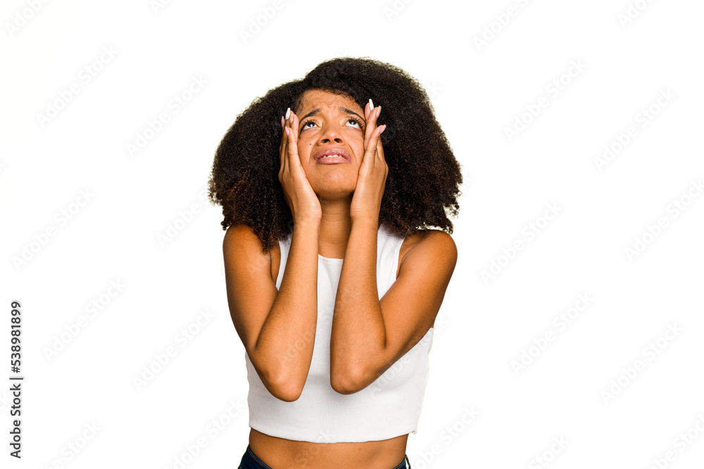 Young African American woman isolated whining and crying disconsolately. Young African American woman isolated whining and crying disconsolately.
