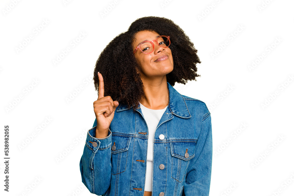Young African American woman isolated showing number one with finger. Young African American woman isolated showing number one with finger.