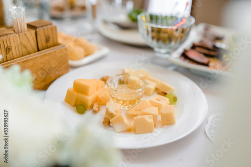 cheese on a plate on the table
