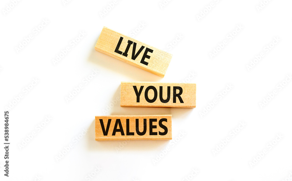 Live your values symbol. Concept words Live your values on wooden blocks. Beautiful white table white background. Business, psychological and live your values concept. Copy space. Live your values symbol. Concept words Live your values on wooden blocks. Beautiful white table white background. Business, psychological and live your values concept. Copy space.