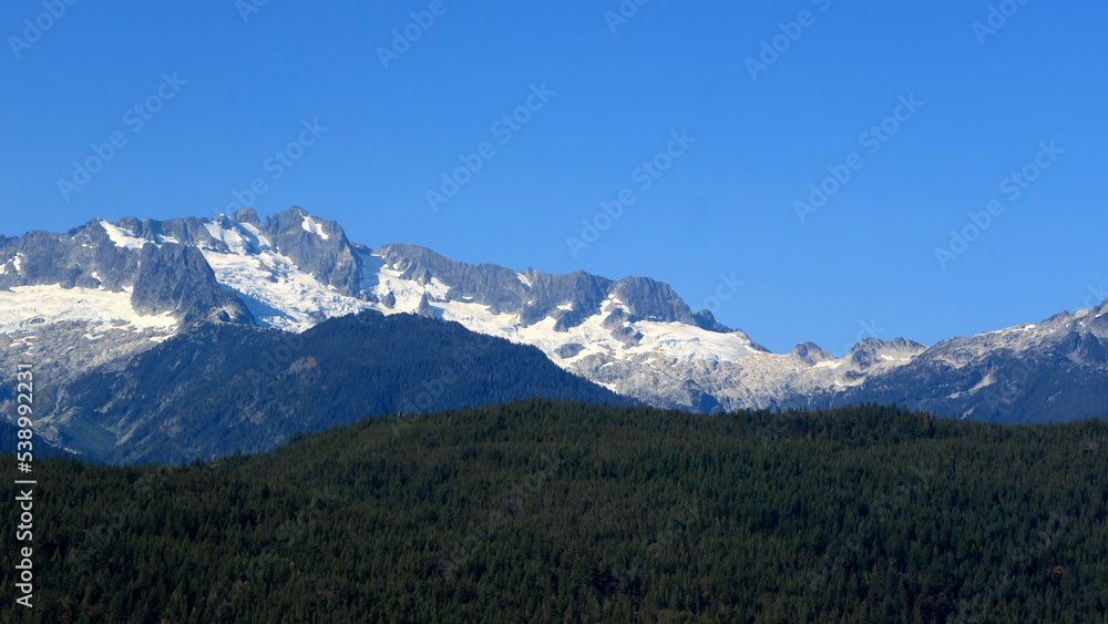 Glacier and mountains, peaks, sky, Canada.