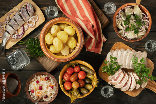 Festive table in the Russian village. Table set for dinner with traditional snacks and dishs of Russian cuisine. top view, flat lay