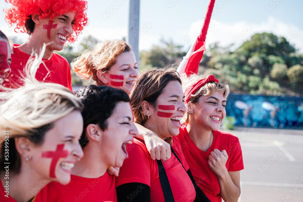 Obraz premium Group of fans celebrating together the victory of their team in the championship