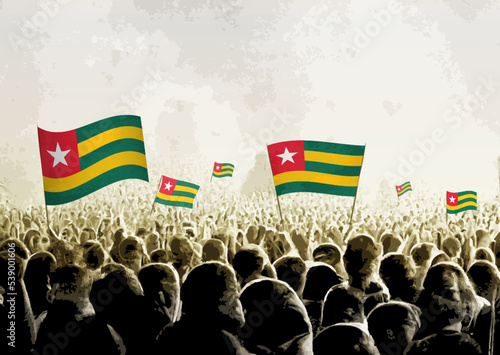 Crowd with the flags of Togo, people cheering national team of Togo. Ai generated illustration of crowd.