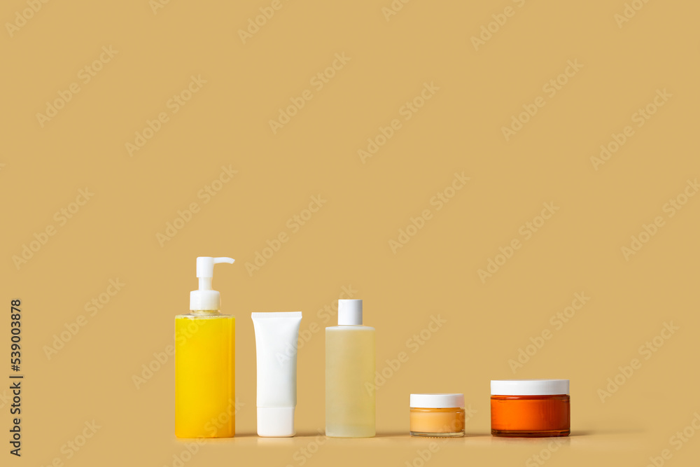 Cosmetic product cleanser, gommage, toner, cream, spf, on packaging on beige background. Cosmetic product cleanser, gommage, toner, cream, spf, on packaging on beige background.