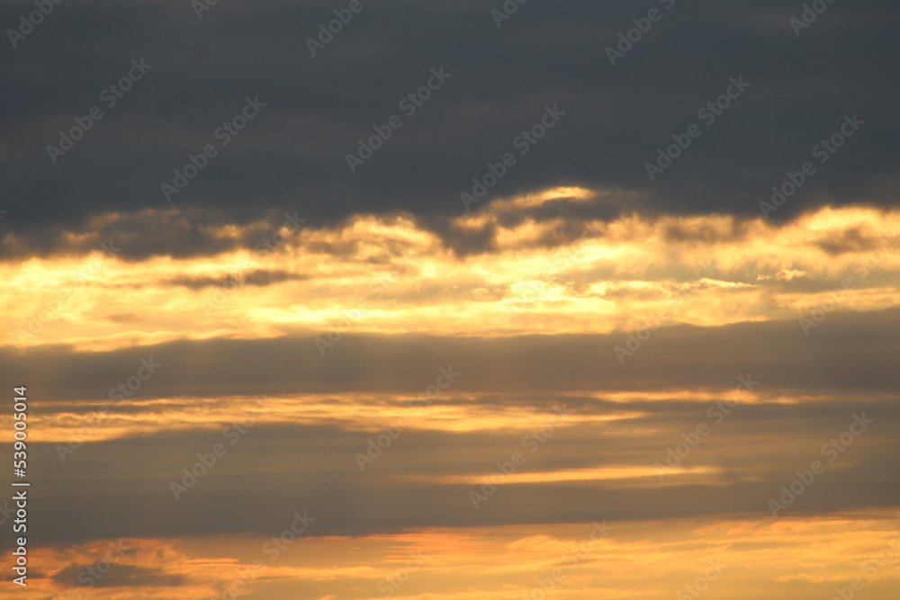 Dramatic sky with clouds at sunset