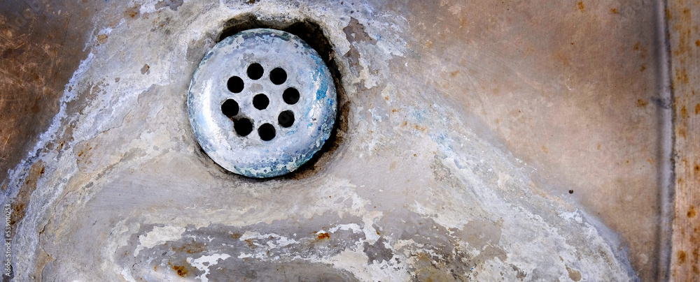 Old Weathered and Stained Drain in Sink Old Weathered and Stained Drain in Sink