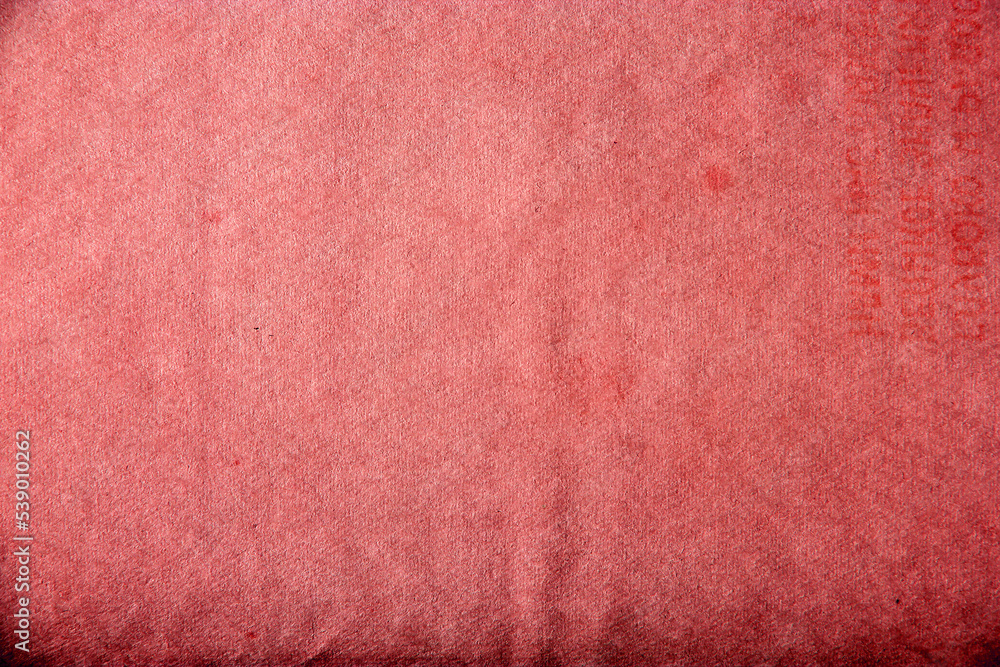 Fototapeta premium Old red vintage paper background or texture