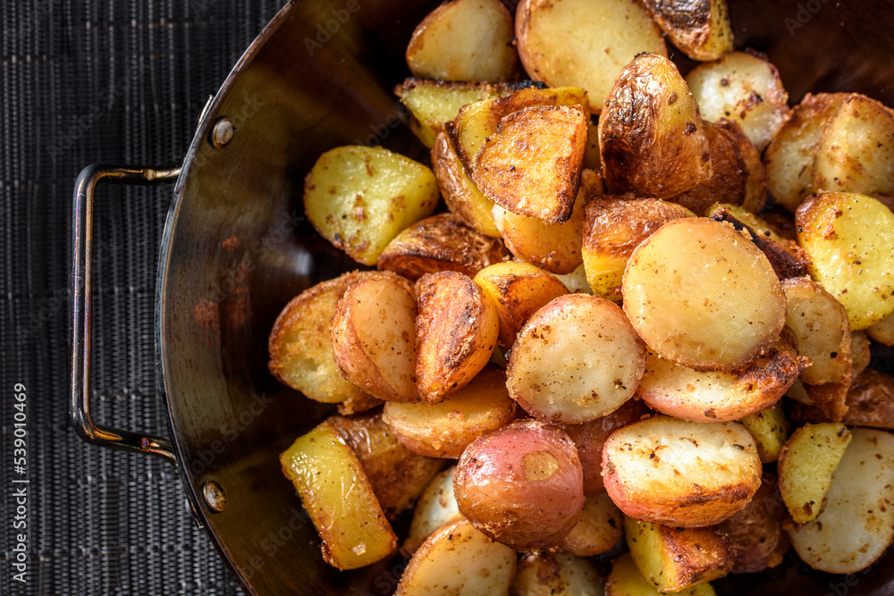 Roasted potato in a wok Roasted potato in a wok