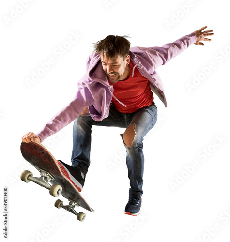 Skateboarder doing a jumping trick isolated
